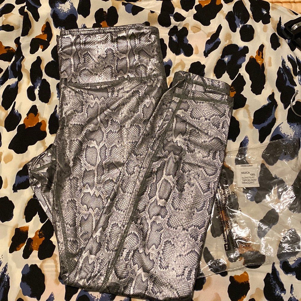 New snake skin leggings size L